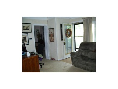 Living room looking into 2nd bedroom