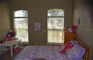 Another Beautiful Secondary Bedroom connects to an