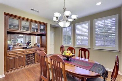 Custom hutch with wine rack enhances the formal di