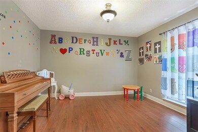 OFFICE/PLAYROOM FEATURES WOOD FLOORS, VERY LIGHT F