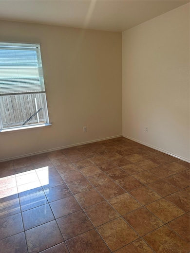Spare room with baseboards