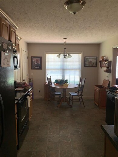 Eat in kitchen with pantry and access to the garag