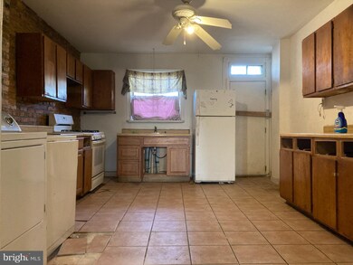 2126 W Lexington St, Baltimore, MD 21223 - photo 3