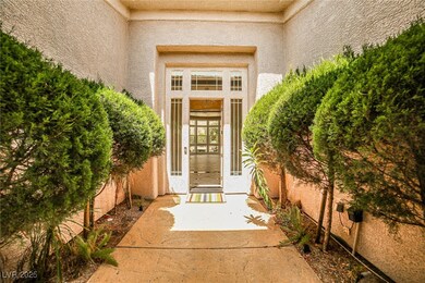 Doorway to property featuring stucco siding