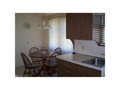 The kitchen is light & bright and has ample space 