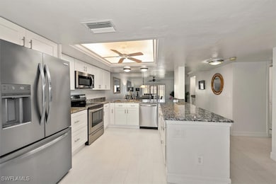 Kitchen featuring appliances with stainless steel