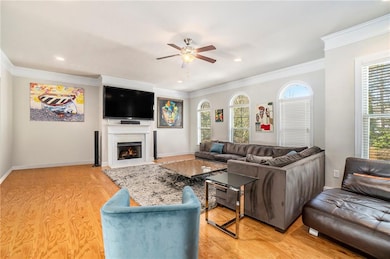 Living room featuring a fireplace with flush heart