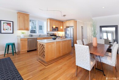 Spacious dining area next to the open kitchen.