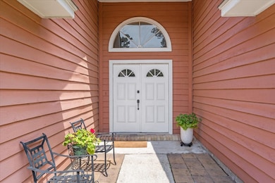 This warm and inviting entryway exudes charm and i