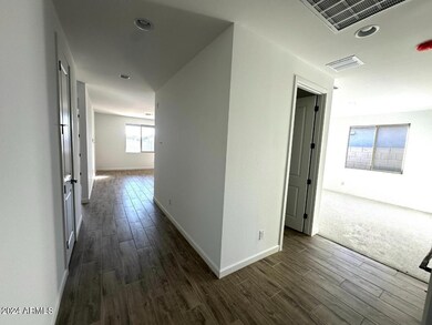 11- Hallway to den and laundry room