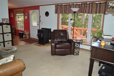 Enjoy views of the Suncook River from your living 