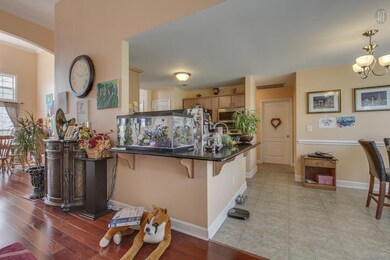 open kitchen with bar and sillstone counter tops