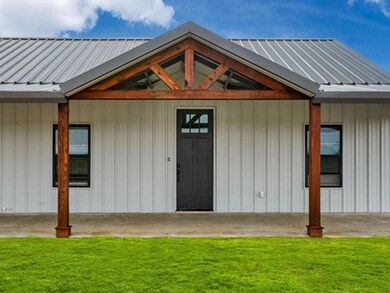 Property entrance with a yard