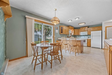 Dining Room/Kitchen - tons of countertop space (notice the extra countertop all along the right side of photo - great for serving!)