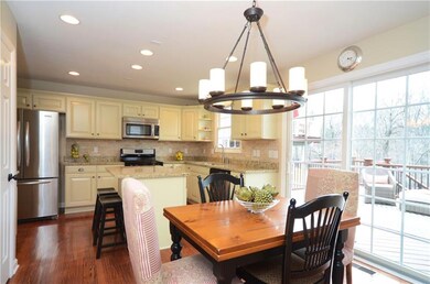 The kitchen includes a sliding glass door that lea
