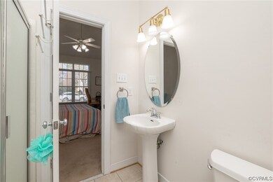 Full Bath opens to the First Floor Bedroom.