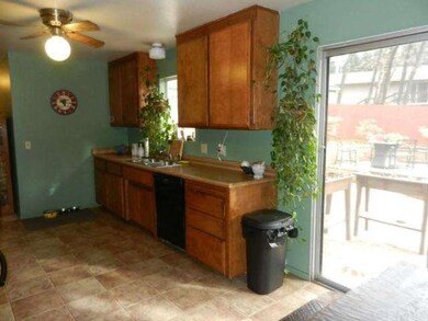 Kitchen & Dining looks out to Back Yard
