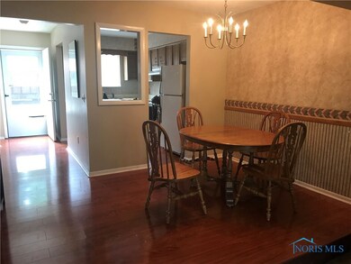 Kitchen and Dining with Wood Floors