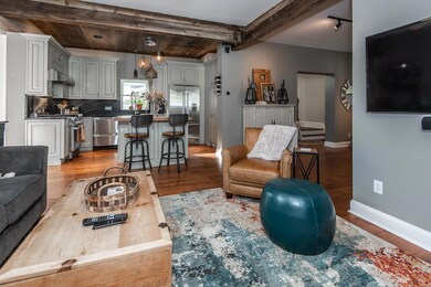 Check out the wood beams!  Hard to believe this old house is so modern!