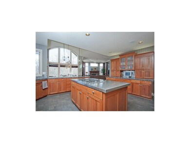 Cherry wood cabinetry, Custom light fixtures, Gran