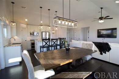 This level has spacious living and dining areas fe