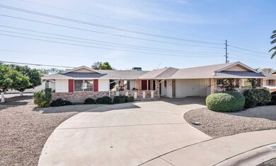 10619 W Caron Dr-large-002-2-Front Exter