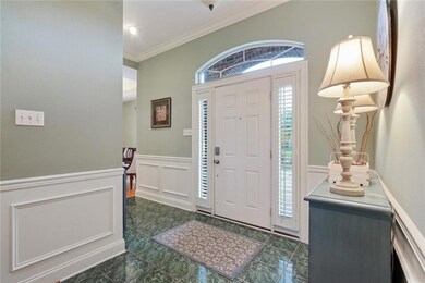 Beautiful foyer provides privacy without sacrifici