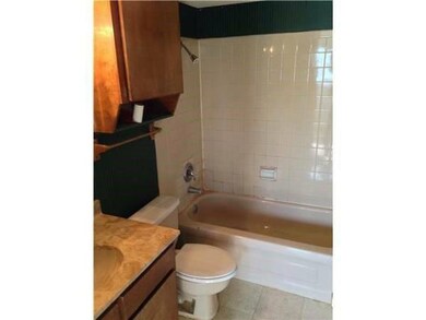 Full bathroom with vanity, tile patterned floorin