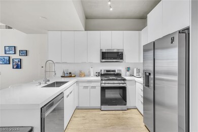Quartz Countertop, New Cabinets, SS Appliances