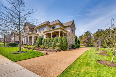 Location! Location! Location! This stunning custom home sits adjacent to acres of beautiful, wooded green space with plenty of room to enjoy outdoor activities.  Immaculately landscaped with 30+ fruit bearing trees and bushes. You will fall in love!