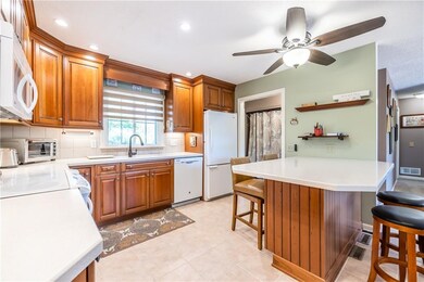 New ceiling fan here.  undermount one piece sink l