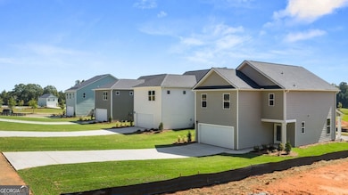 Rear Entry Garage with Plenty of space for guests.