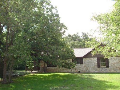 Front view of the home showcasing the stoned exter