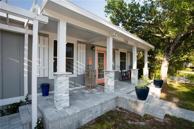 Gorgeous front porch...have a cup of coffee or a cocktail in the rocker and watch the world pass by