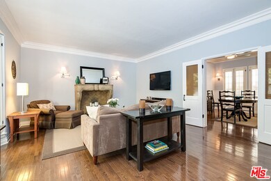 SPACIOUS LIVING ROOM WITH WOOD FLOORS