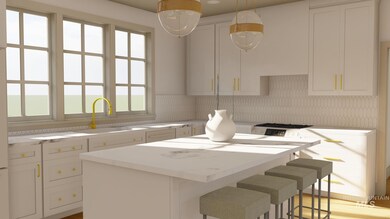 Kitchen featuring a center island, light countertops, plenty of natural light, and white cabinets