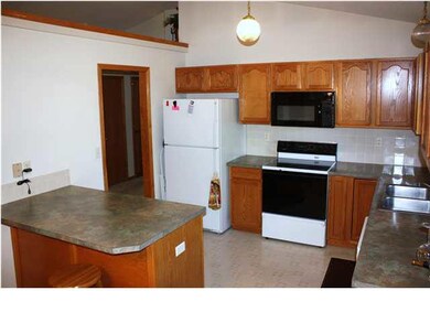 KITCHEN WITH PLENTY OF COUNTER AND CABINET SPACE. 