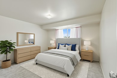 Bedroom with carpet floors and baseboards