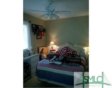 Bedroom. Neutral Colored Bedroom with Ceiling Fan