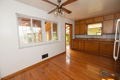 Eat-in Kitchen with Wood Floors