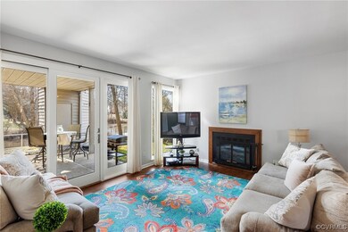 Living room with wood-type flooring