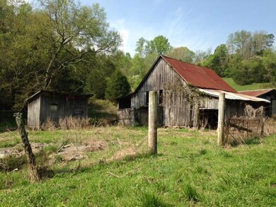 One of the barns and another outbuilding