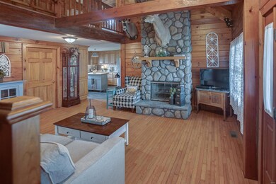 Large living room with cathedral ceilings.
