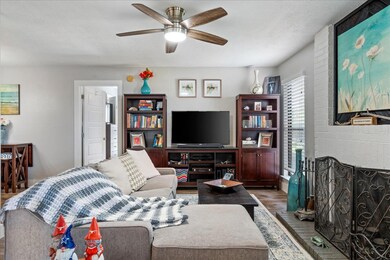 Living room featuring wood finished floors, ceili