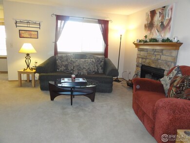 WOOD FIREPLACE IN LIVING ROOM