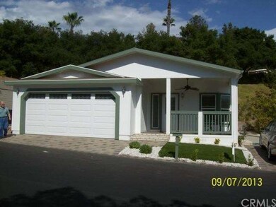 Front of home, with attached double garage