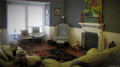 Living room, wood burninf fire place.