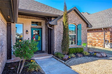 Thriving landscaping framing front entrance.