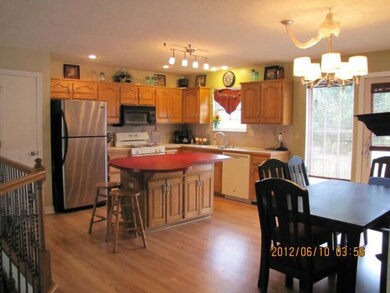 Kitchen with island and pantry.  Great work area a