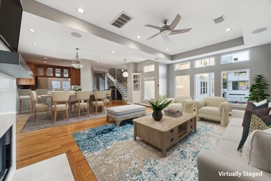 Second floor: A dramatic wall of windows floods th